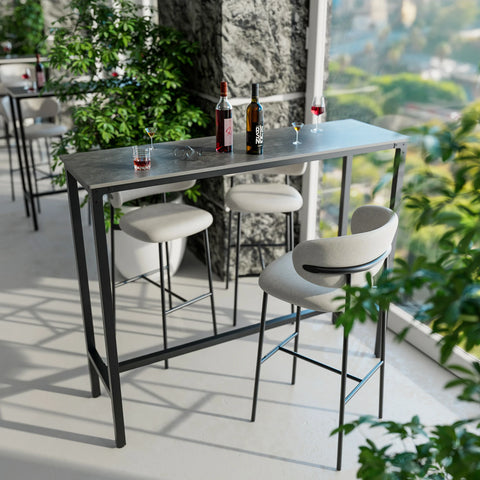 Dark grey stone top bar table on a balcony