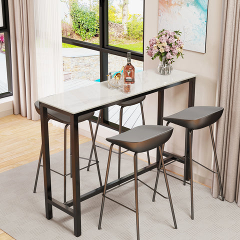 Stone top bar table with two bar stools in a living space
