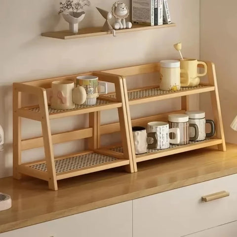 Two-tier bamboo shelf on a kitchen counter with crockery