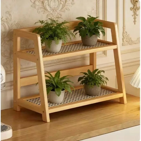 Two-tier bamboo shelf holding potted plants