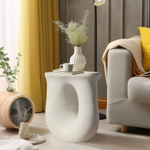 U-shaped side table in off-white lightweight concrete