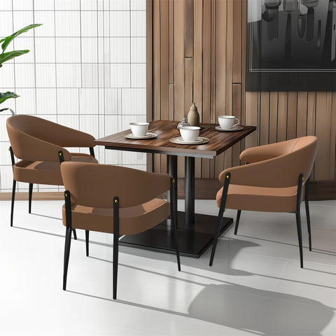 Upholstered dining chairs around a round dining table