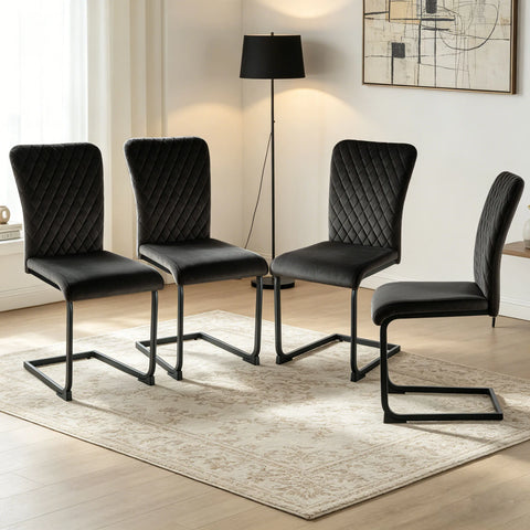 Set of four black velvet high back dining chairs on black cantilever frames