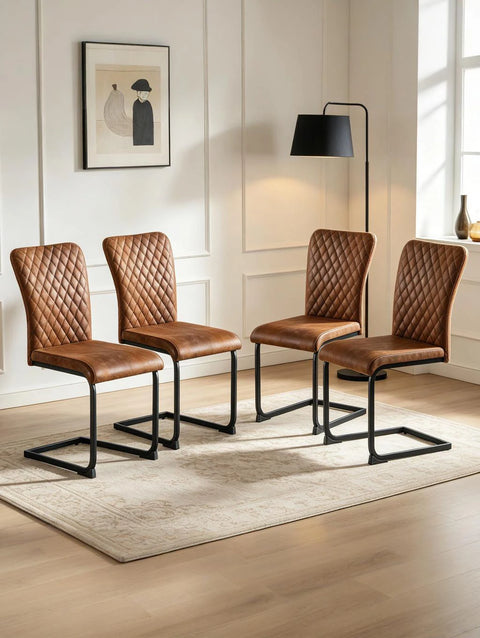 Set of four brown velvet high back dining chairs on black cantilever frames