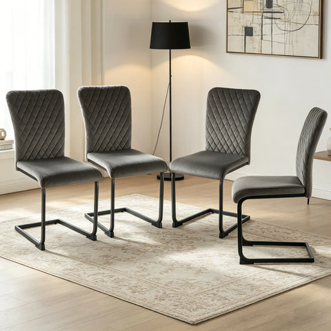 Set of four grey velvet high back dining chairs on black cantilever frames