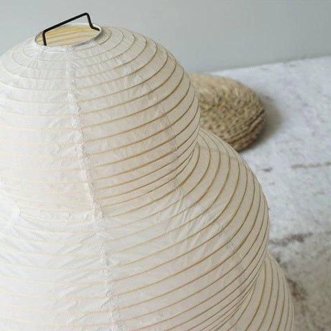 Close-up of the lamp's pleated paper shade