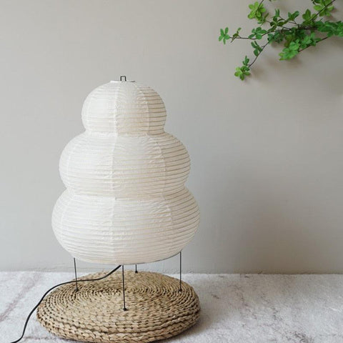 Tiered paper lantern lamp unlit, showing the pleated paper shade
