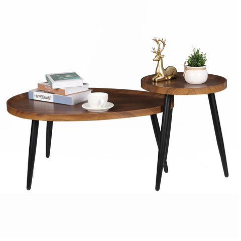 Walnut nesting coffee tables with books and ornaments