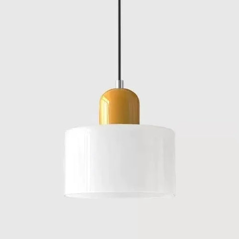 White glass pendant light with a mustard cap
