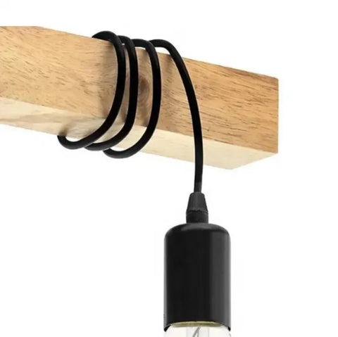 Detail of the black flex wound around the wooden bar
