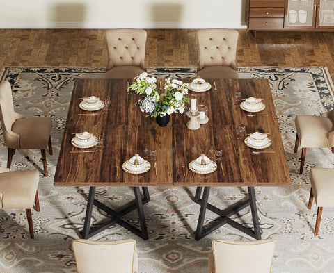Overhead view of the brown wood dining table laid for six