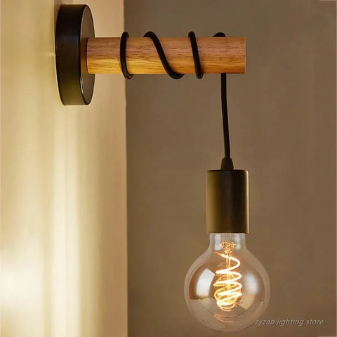 Close-up of the sconce's wooden beads and filament bulb