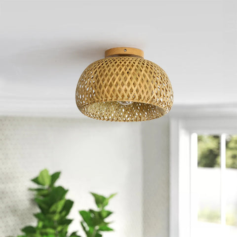 Woven bamboo ceiling lamp in a bright room with plants