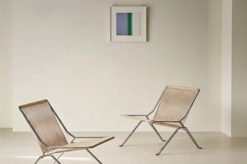 Woven cord lounge chair on a pale rug