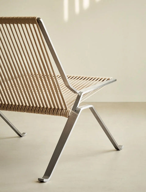 Woven cord lounge chair seen from the side