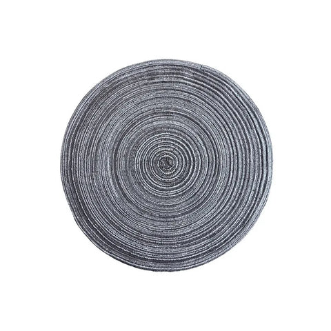 Grey yarn woven round placemat