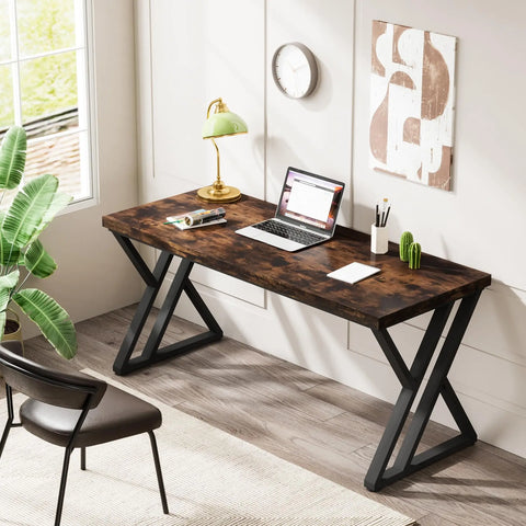 Z-frame writing desk with a lamp and laptop in a home office