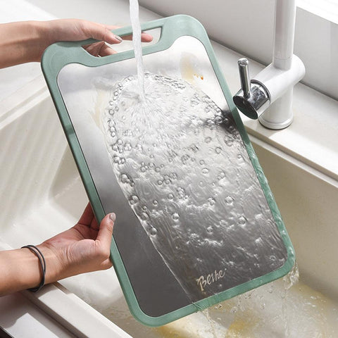 Double-sided stainless steel cutting board