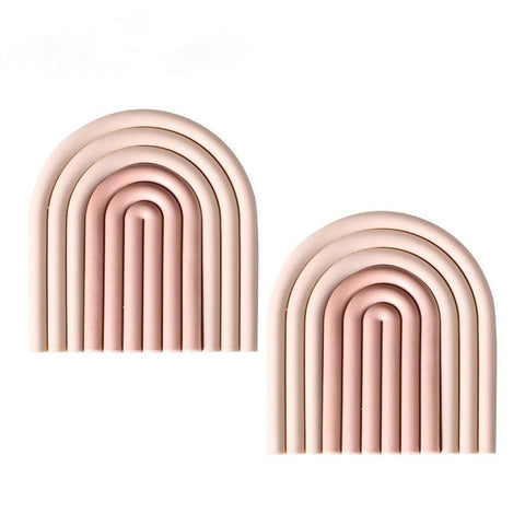 Arch-shaped coasters in rose, set of two