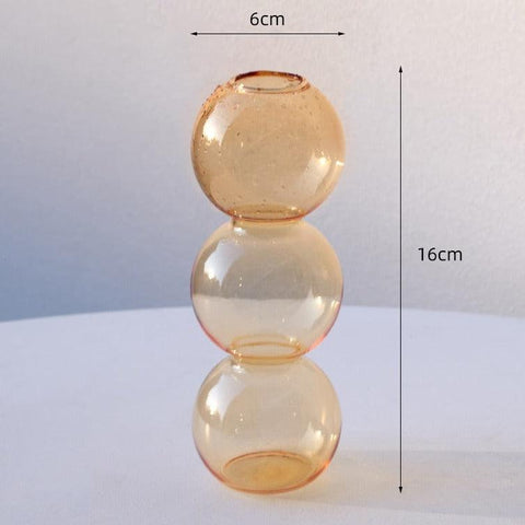 Bubble glass vase in apricot, 6cm wide and 16cm tall
