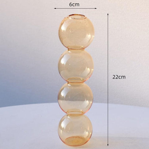 Bubble glass vase in apricot, 6cm wide and 22cm tall