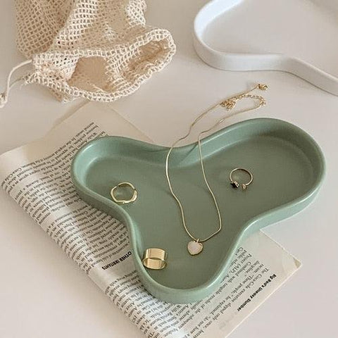 Cloud accessory tray in green, cloud-shaped ceramic dish holding jewellery