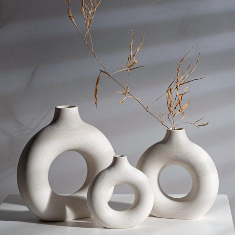 Donut vases styled with dried grasses