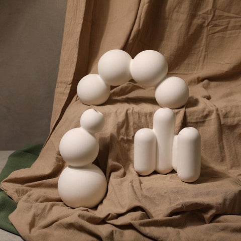 Droplet ceramic vases in a range of shapes and sizes