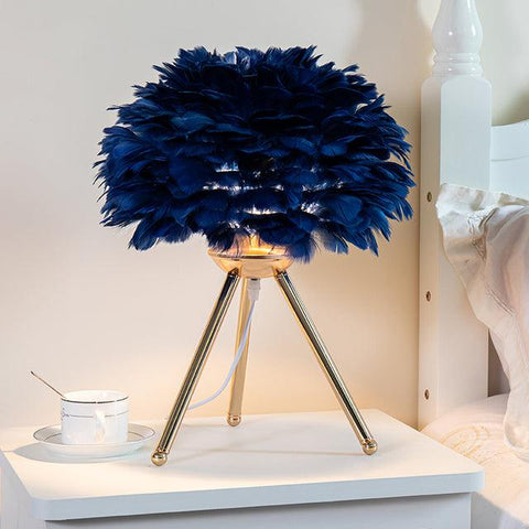 Feather table lamp, dark blue shade on a gold tripod base