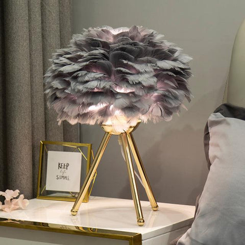 Feather table lamp, grey shade on a gold tripod base