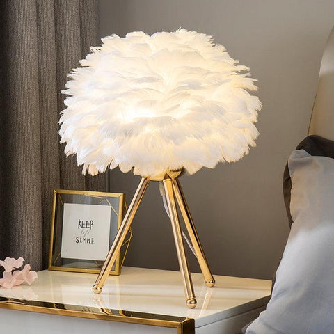 Feather table lamp, white shade on a gold tripod base