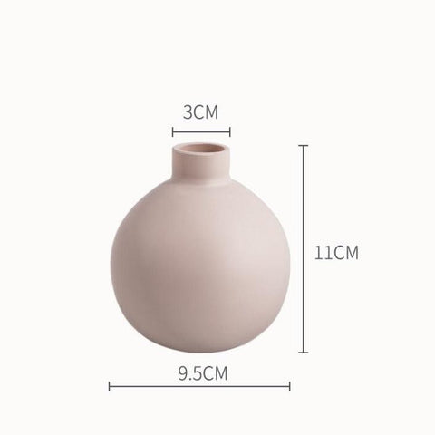 Scandi ceramic vase in dusty pink, 9.5cm wide and 11cm tall with a 3cm neck