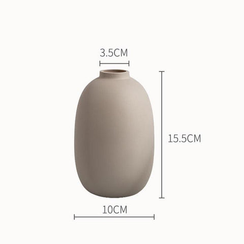 Scandi ceramic vase in sand, 10cm wide and 15.5cm tall with a 3.5cm neck