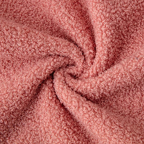 Close-up of the plush teddy cushion fabric