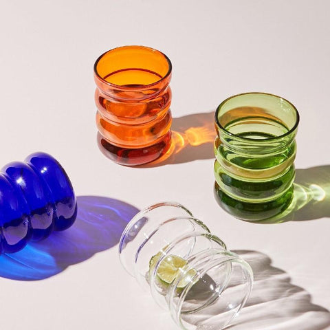 Retro ribbed glass tumblers in orange, green, blue and clear