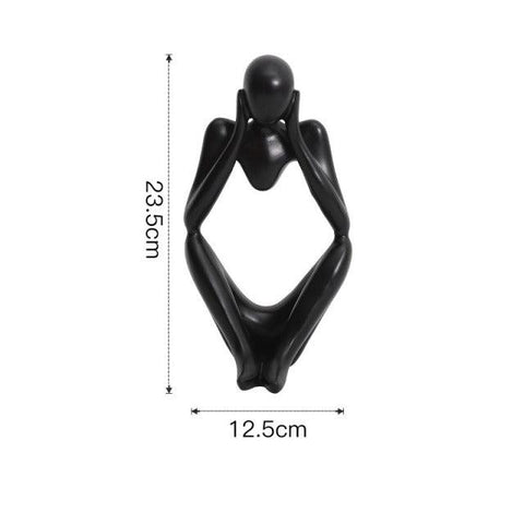 Thinker sculpture pose C in black, 23.5cm tall and 12.5cm wide