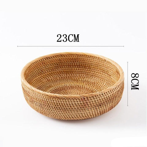 Round rattan bowl, 23cm across and 8cm deep