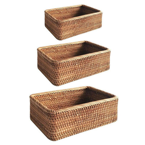 Two rattan storage baskets stacked, showing the sizes